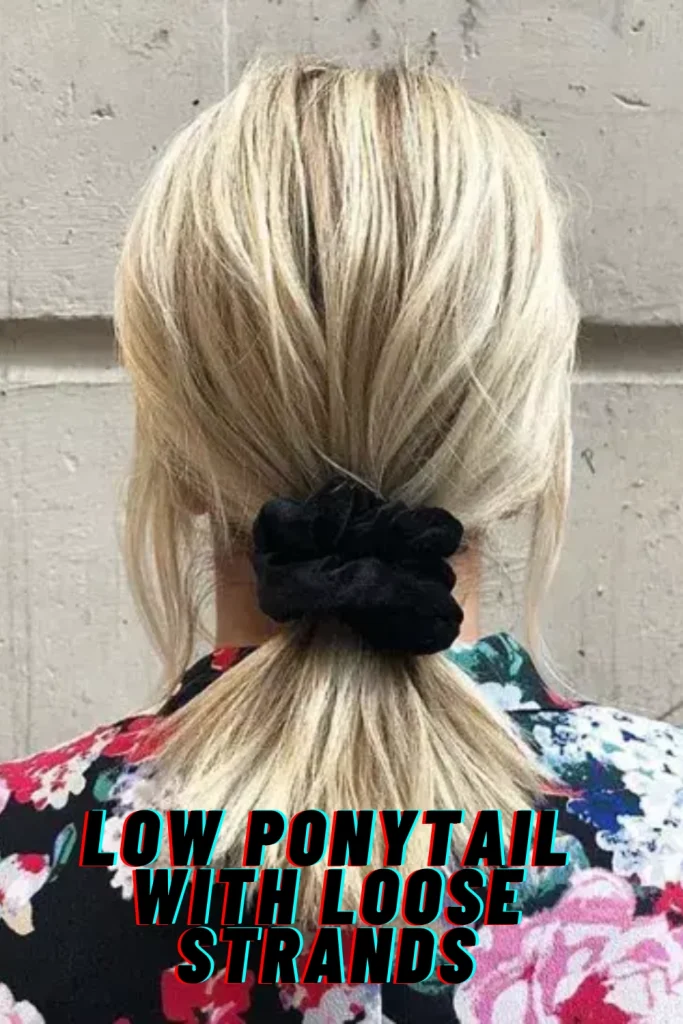 Low Ponytail with Loose Strands