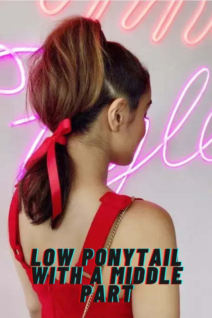 Low Ponytail with a Middle Part