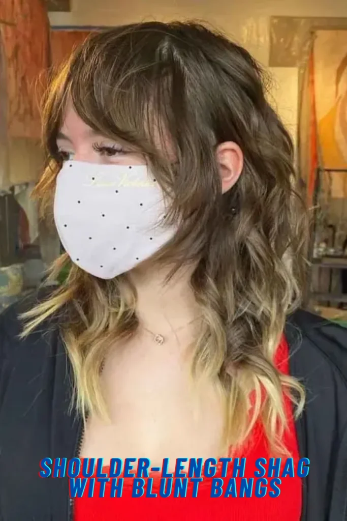 Shoulder-Length Shag with Blunt Bangs