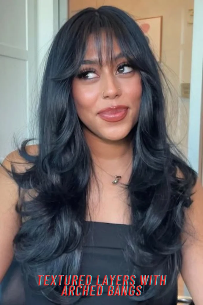Textured Layers with Arched Bangs